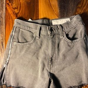 washed out black high rise shorts still have the tag on, size 24.